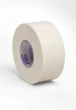 A roll of white tape on a white background.