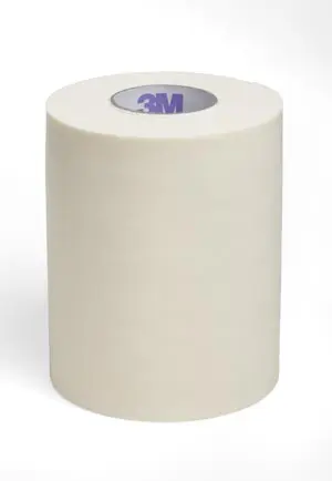 A roll of white tape on a white background.