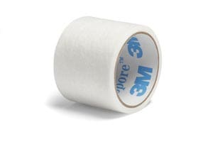 A roll of white tape on a white background.