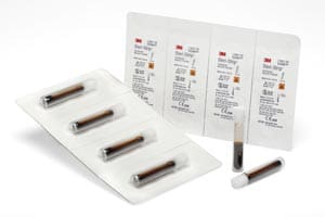 A pack of syringes and syringes on a white background.