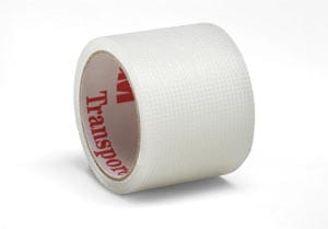 A roll of white tape on a white background.