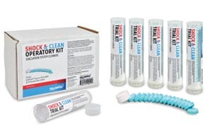 A box of dental products with some blue tubes