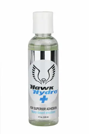 A bottle of hawkwik super lube on a white background.