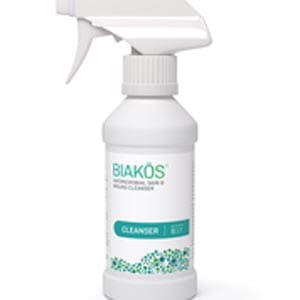 A bottle of blikos cleaner on a white background.