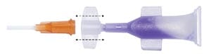 A purple and orange plastic syringe with a hole in the middle.