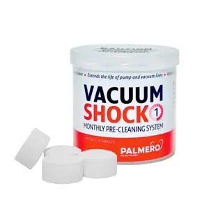 A tub of vacuum shock is sitting next to some plastic caps.