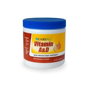 A jar of vitamin aed on a white background.