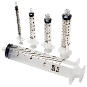 A group of syringes on a white background.